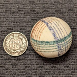 Exceptional Large 1-7/32" Unglazed Brightly Colored China with Blue, Red & Green Intersecting Spirals