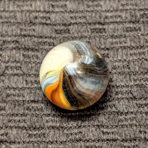 11/16" Red, White, Orange, Blue & Yellow Sunburst with Heavy Oxblood Covering 30% of the Marble